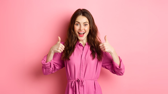 Happy lady on pink background